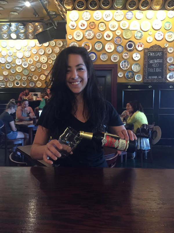 Mary Katherine Peek pouring her favorite craft beer, Samuel Smith's Taddy Porter at Little Rock Flying Saucer. Learn more about Arkansas' Best Bartender.